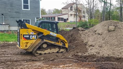 Spreading Soil with a Skid Steer 